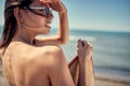 Surfing. woman on the beach Royalty Free Stock Photo