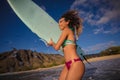 Surfing smiling girl having fun with surfboard Royalty Free Stock Photo