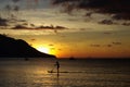 Surfing at sundown, Beau Vallon, Seychelles Royalty Free Stock Photo