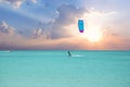 Surfing at sunrise at Aruba in the Caribbean Sea Royalty Free Stock Photo