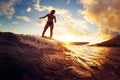 Surfing at Sunset Royalty Free Stock Photo