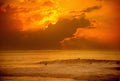 Surfing at sunset on Hawaii Royalty Free Stock Photo