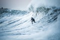 Surfing - A Surfer Drops In On A Huge Wave In Santa Barbara County, California
