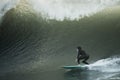 Surfing - A Surfer Drops In On A Huge Wave In Santa Barbara County, California Royalty Free Stock Photo