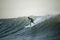 Surfing - A Surfer Drops In On A Huge Wave In Santa Barbara County, California