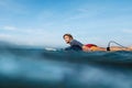 Surfing. Surfer Man On Surfboard Portrait. Handsome Guy In Wetsuit Swimming In Ocean. Royalty Free Stock Photo