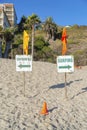 Surfing and swimming signboard at the beach in San Clemente, California