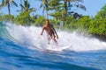 Surfing a Wave. Bali Island. Indonesia. Royalty Free Stock Photo