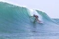 Surfing a Wave. Bali Island. Indonesia. Royalty Free Stock Photo