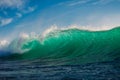 Surfing wave in sea. Breaking turquoise wave sunny day