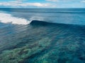 Surfing wave in tropical ocean at Mauritius. Aerial view of One eye Royalty Free Stock Photo