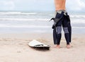 Surfing is a way of life. A young male surfer getting ready to go for a surf on a hot summers day. Royalty Free Stock Photo