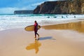 Surfing woman surfboard ALgarve Portugal Royalty Free Stock Photo