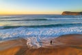 Surfs up aerial sunrise seascape with surfer