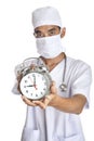 Surgeon with an alarm clock Royalty Free Stock Photo