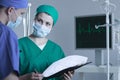 Surgeon consulting patient condition Royalty Free Stock Photo