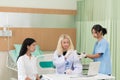 Surgeon examine a patient in preparation for cosmetic surgery in doctors office. Cosmetology concept Royalty Free Stock Photo