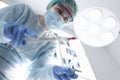 Surgeon female doctor in operating room portrait. Royalty Free Stock Photo