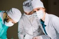 The surgeon and his assistants makes an operation. Royalty Free Stock Photo