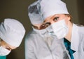 The surgeon and his assistants makes an operation. Royalty Free Stock Photo