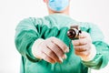 Surgeon holding antique, old fashioned medical drill Royalty Free Stock Photo