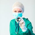 Surgeon holding stethescope outwards