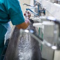 Surgeon in hospital washing thorouughly his hands Royalty Free Stock Photo