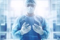 A surgeon medical doctor prepare to perform surgery in hospital operating room, with blurred background, healthcare and hospital