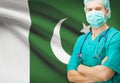 Surgeon with national flag on background series - Pakistan