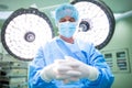 Surgeon preparing for operation in operation room Royalty Free Stock Photo