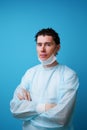 Surgeon in sterile blue uniform Royalty Free Stock Photo