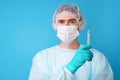 Surgeon in sterile blue uniform, medical gloves and mask Royalty Free Stock Photo