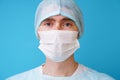 Surgeon in sterile blue uniform, medical gloves and mask Royalty Free Stock Photo