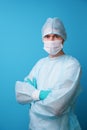 Surgeon in sterile blue uniform, medical gloves and mask Royalty Free Stock Photo