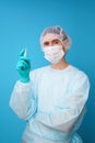 Surgeon in sterile blue uniform, medical gloves and mask Royalty Free Stock Photo