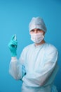 Surgeon in sterile blue uniform, medical gloves and mask Royalty Free Stock Photo