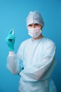 Surgeon in sterile blue uniform, medical gloves and mask Royalty Free Stock Photo