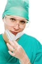 Surgeon woman in protective glasses and mask Royalty Free Stock Photo