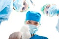 Surgeons above patient Royalty Free Stock Photo