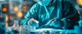 Surgeons hand performing a precise operation with surgical instruments