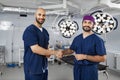 Surgeons Handshake in Operating Room Royalty Free Stock Photo