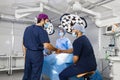 Surgeons Handshake in Operating Room Royalty Free Stock Photo