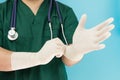 Surgeons with latex gloves Royalty Free Stock Photo