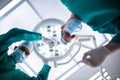 Surgeons operating in operation theater Royalty Free Stock Photo