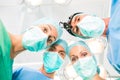 Surgeons operating patient in operation theater Royalty Free Stock Photo