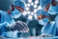 Surgeons perform precise medical operation in a modern operating room environment Royalty Free Stock Photo