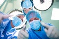 Surgeons performing operation in operation room Royalty Free Stock Photo