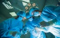 Surgeons standing above of the patient before Royalty Free Stock Photo