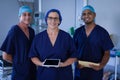 Surgeons standing in hospital clinic