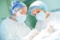 Surgeons at work. female doctors operating in child surgery hospital Royalty Free Stock Photo